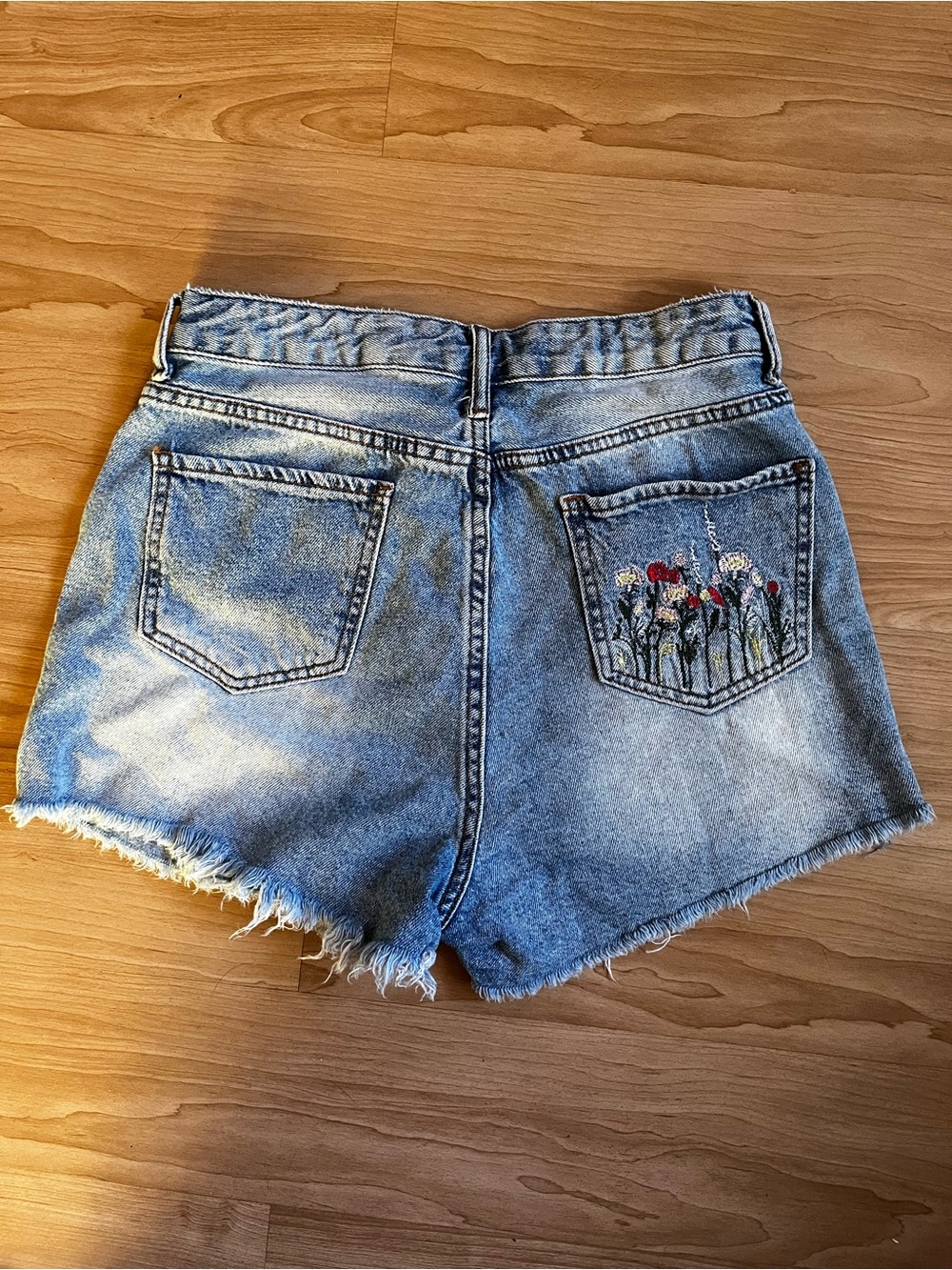 Extra high waisted distressed Denim Shorts with Embroidered floral pocket